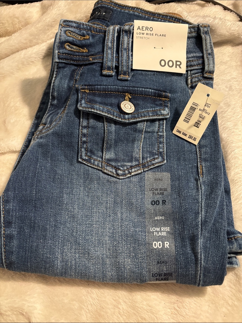 AERO Low Rise Flare Jeans — Medium Blue Wash